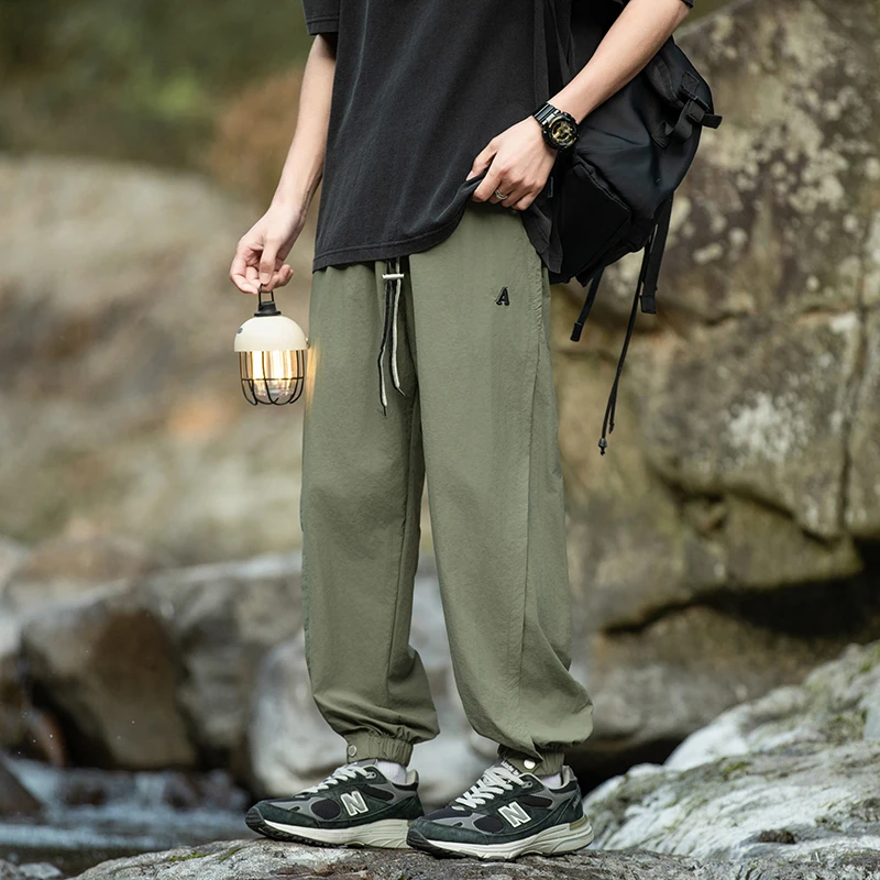 

Men's Clothing Spring Autumn Solid Color Elastic High Waisted Pockets Letter Embroidered Casual Bloomers Cargo Trousers Pants