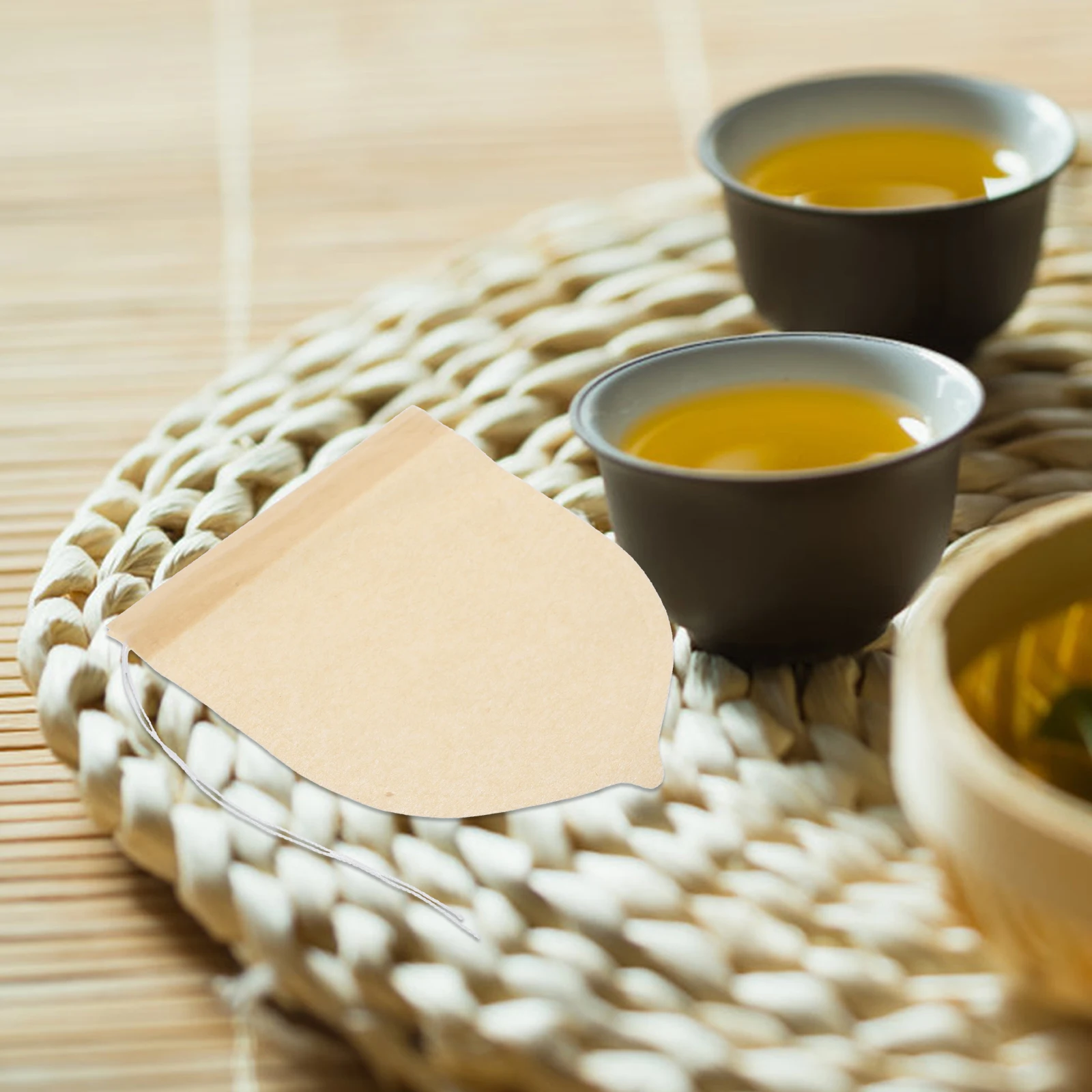 

100pcs Disposable Tea Filter Bags Drawstring Loose Leaf Strainer Seasoning Infuser Brew Herb Spices Aromatic Chinese Medicine