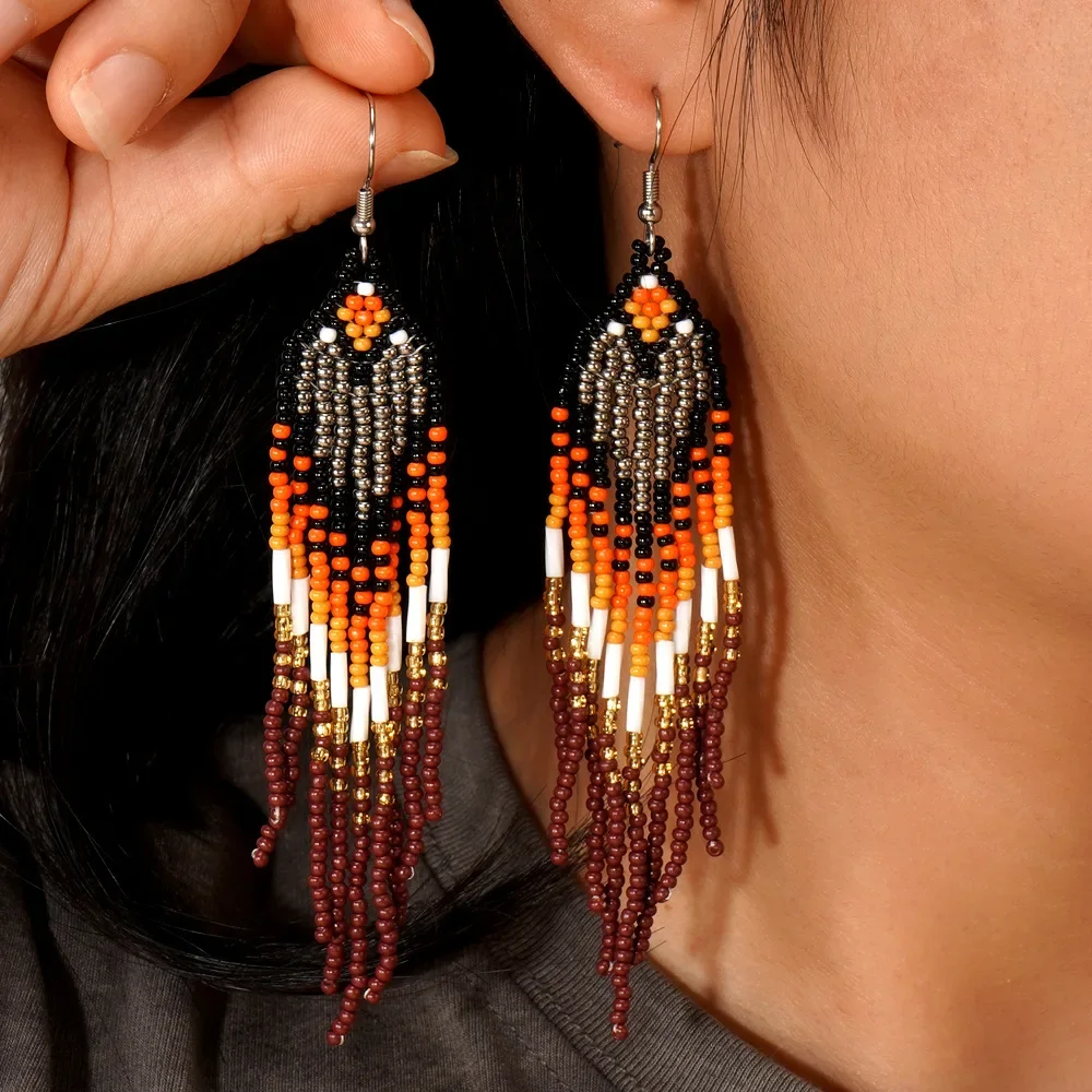 

Bohemian Hand-Knitted Tassel Earrings with Gradient Color Alloy Female Retro Simple Rice Bead Earrings