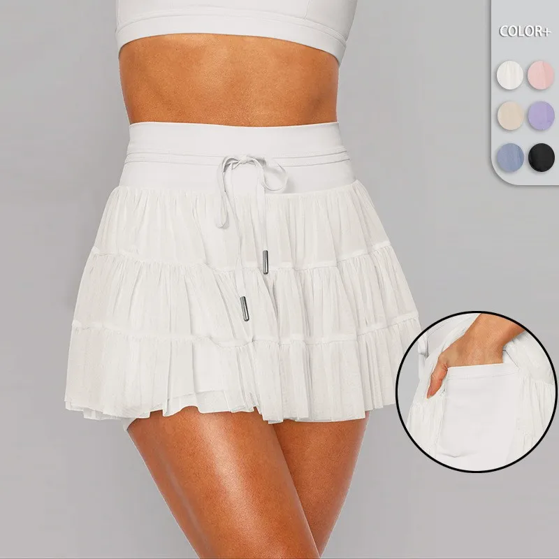 تنورة نسائية صغيرة جديدة بطبقة مزدوجة من القماش الشبكي سراويل أمان مضادة للضوء للفتيات جيب رياضي جميل برباط كولوتيس