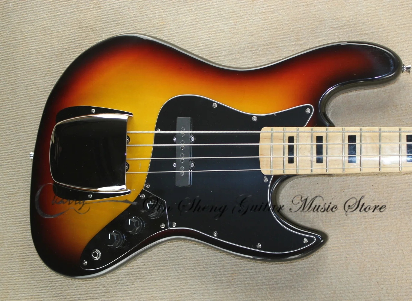 Custom 4 string sunrise bass, fixed bridge, solid wood body, maple neck, maple fingerboard, pickups with iron shell