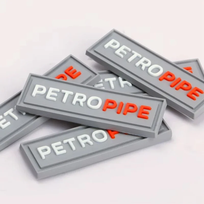 

Custom Embossed Rubber Patch Logo Soft PVC Sewing Patches Heat Transfer Badge