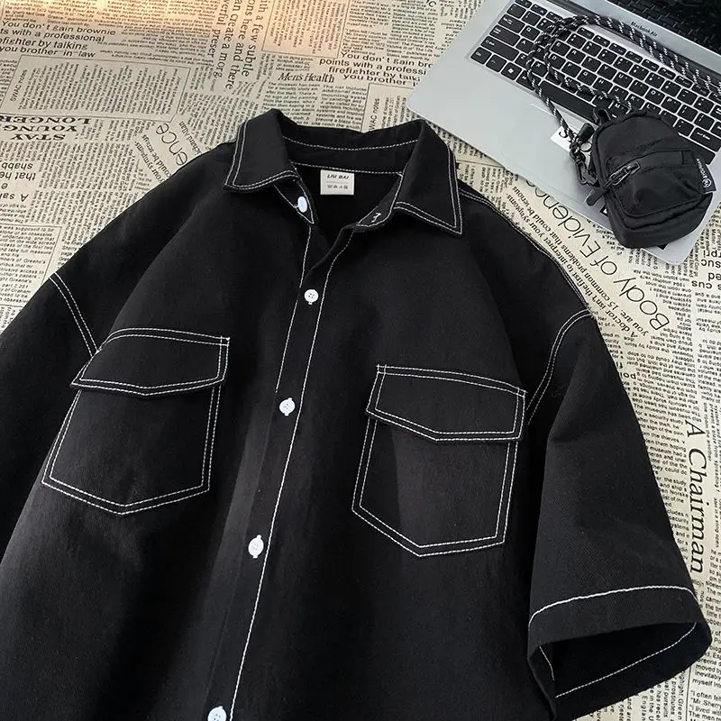 Camisa de manga corta de estilo neutro japonés para hombre, camisa de solapa suelta de nicho de diseño superior, ropa de trabajo informal, chaqueta