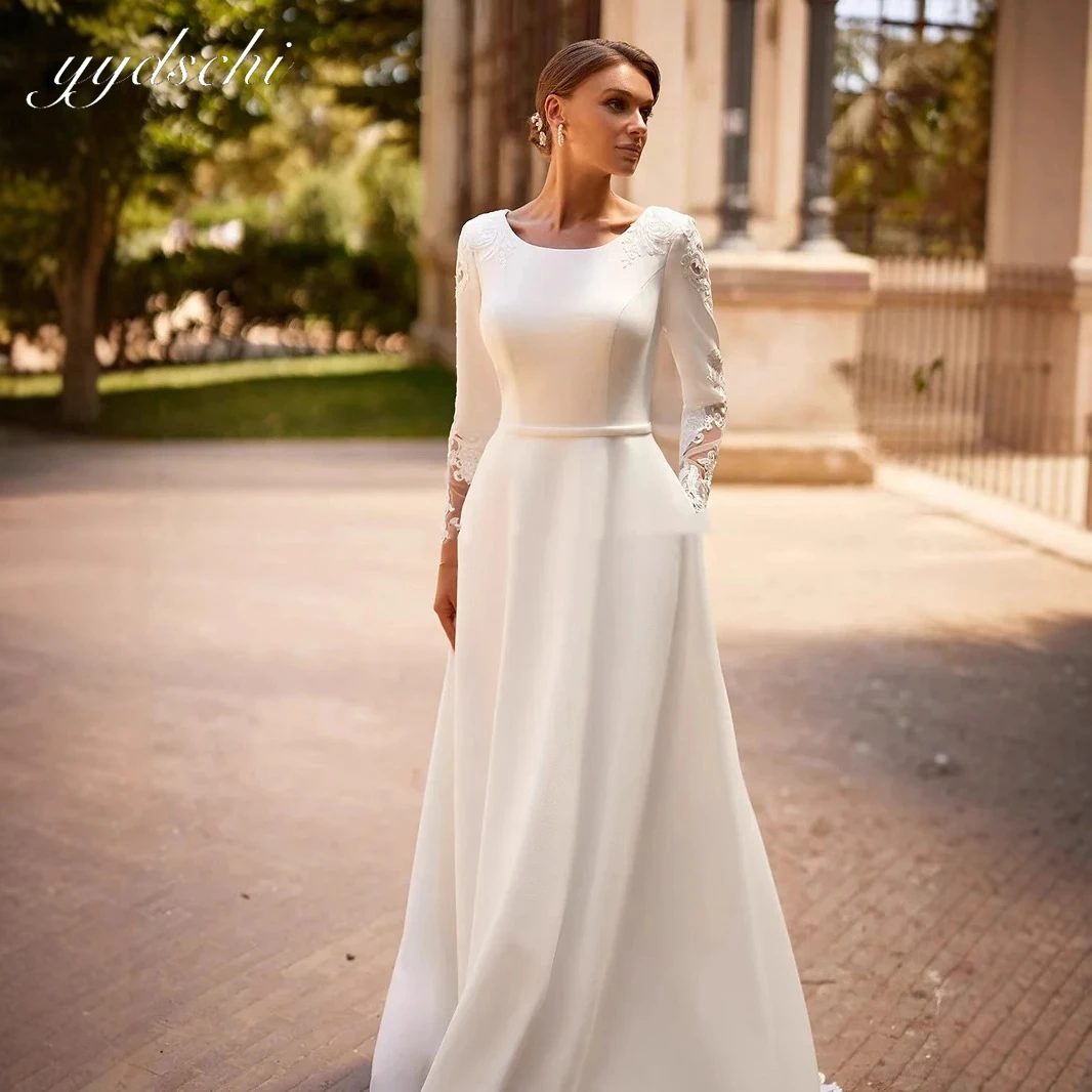 カスタマイズされたエレガントなサテンOネック長袖シンプルウェディングドレス 女性用2025 スウィープトレインブライダルガウン 花嫁衣装