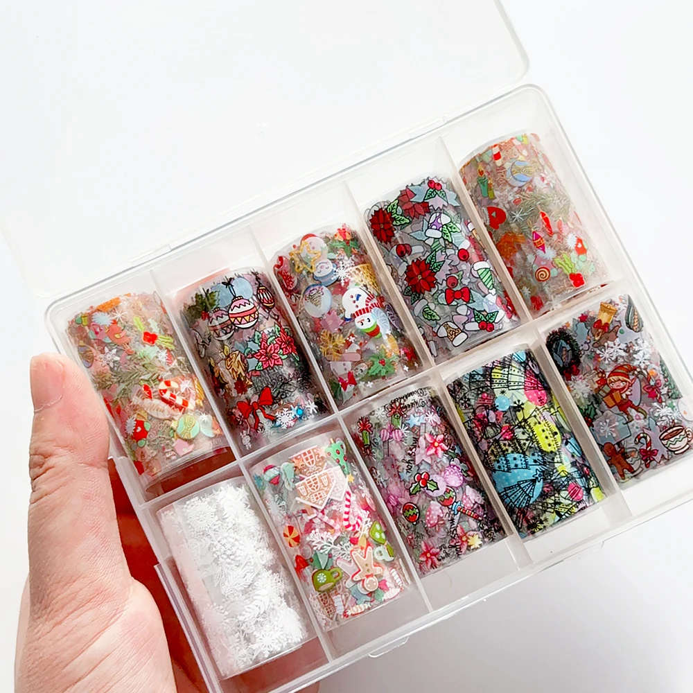 10 rotoli di adesivi per trasferimento di fogli per nail art natalizi, fiocchi di neve colorati, albero di Natale, modelli di pupazzo di neve, decalcomanie per unghie, manicure invernale