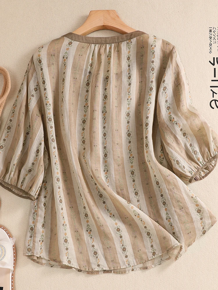 เสื้อท็อปผ้าลินินพิมพ์ลายทางแนวตั้งสีแฟชั่น ไซส์ใหญ่สำหรับผู้หญิง ดีไซน์ใหม่ ตกแต่งกระดุมทรงกลม แขนยาวเจ็ดส่วน
