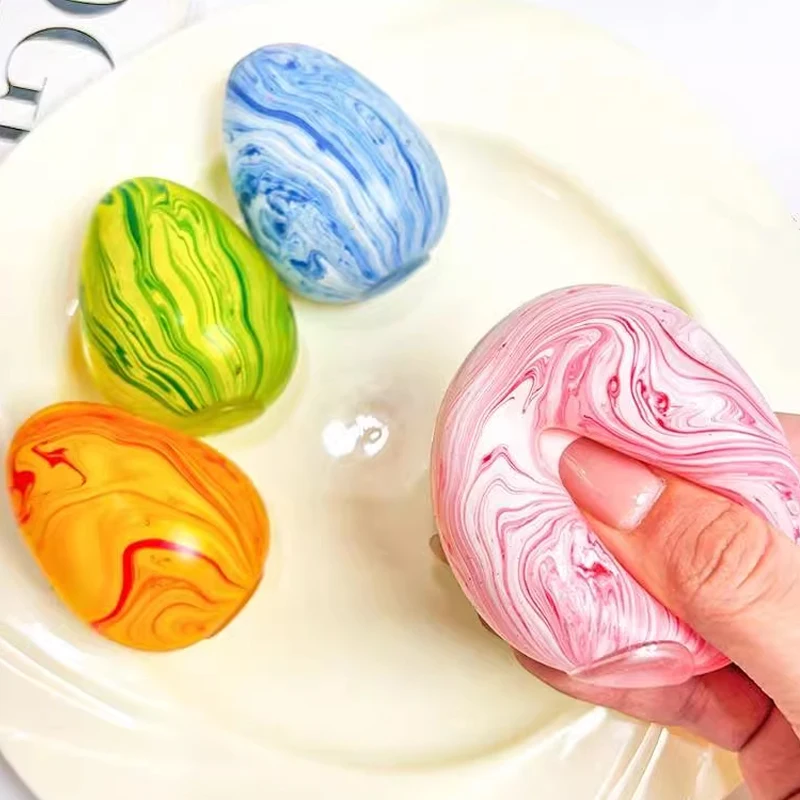 جديد عصري ملون الريوليت البيض العجين كرات عيد الفصح المحمولة لعبة تخفيف التوتر بسط الإجهاد الكرة لعبة ممتعة هدية