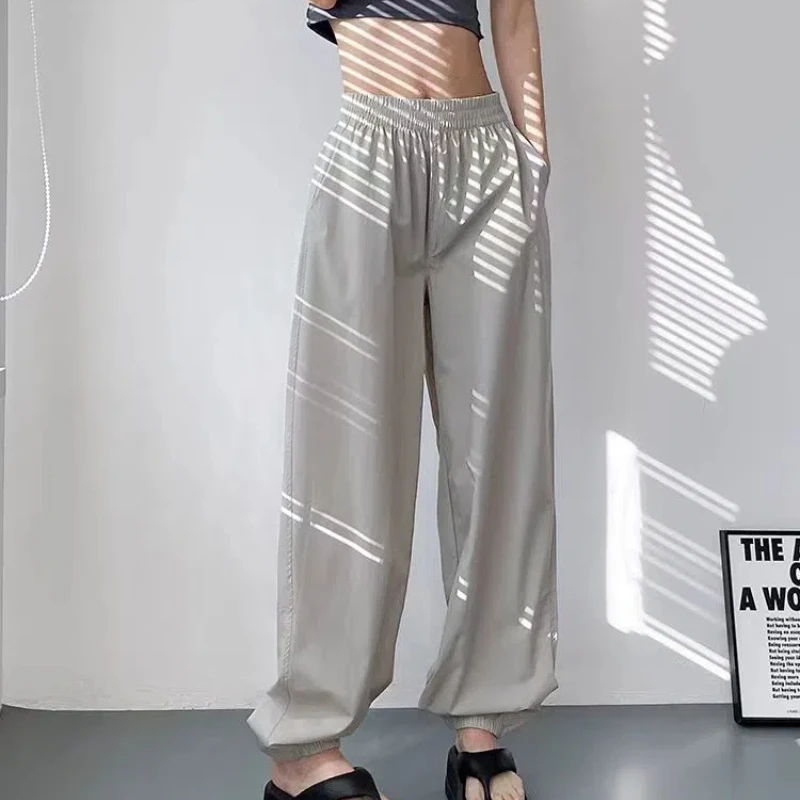 

Summer Ice Silk 2024 Women's New Splicing Elasticized High-waisted Pocket Printed Fashion Loose Minimalist Casual Straight Pants