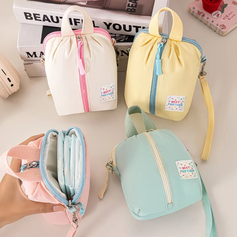 Niedliche und schlichte Nischen-Reisetasche für Damenbinden, tragbare faltbare Allzwecktasche, Mini-Geldbörse, Lippenstift- und Schlüsselaufbewahrungstasche