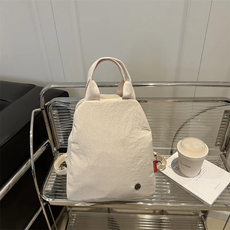 

Mobile phone backpack bag women's versatile new fashion women's high-value cloth bag casual multi-function portable shoulder bag