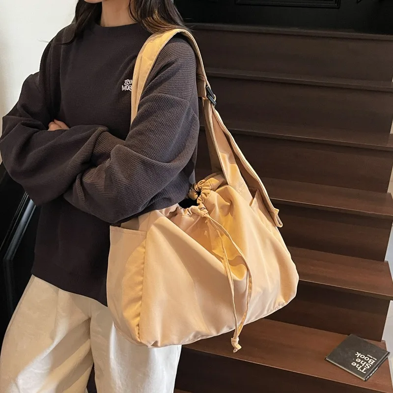 

Женская парусиновая сумка через плечо, большие сумки для женщин, 2025 год, большая студенческая спортивная ткань на шнурке, ткань для покупок, Bolsas для девочек