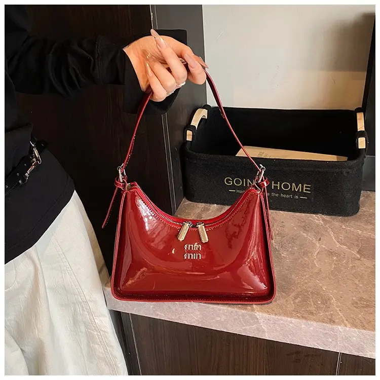 

Hand carrying fashionable patent leather dumpling bag 2025 new simple and versatile underarm bag high-end shoulder women's bag