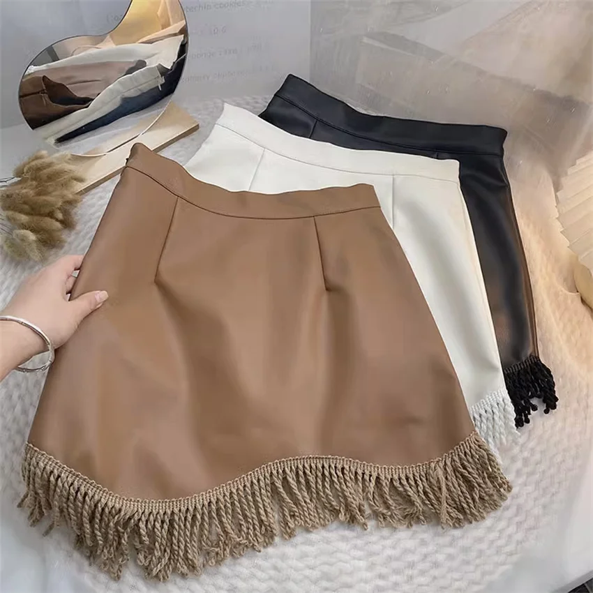 

Gowyimmes Autumn Winter Women PU Skirts Slim Lady High Waist Irregular Tassel Skirt Faux Leather Bottomigs Hip Package Mini 1704