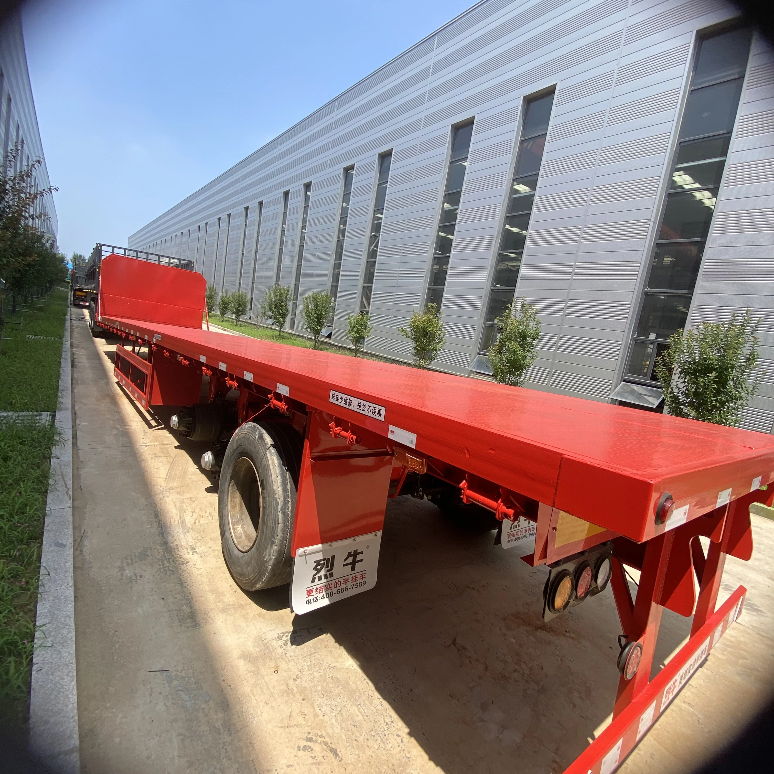 JKG45Ft 40Ft سعر المصنع نصف مقطورات فولاذية 3 محاور سرير مسطح مقطورة مسطحة للبيع