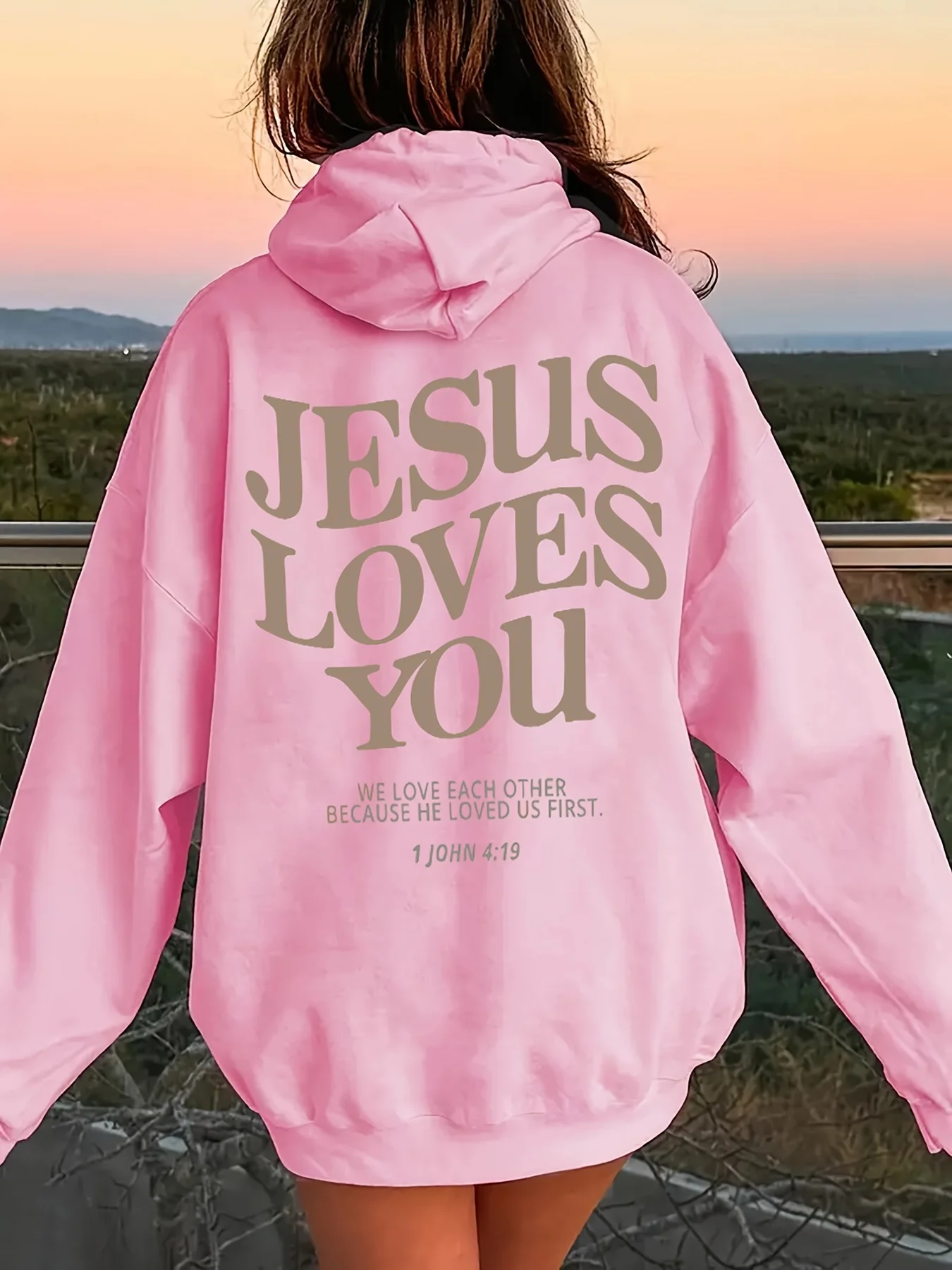 Festive Pink Hoodie with Bold Lettering Jesus Loves You Print Hoodie Casual Street Style Pullover with Fall and Winter Seasons