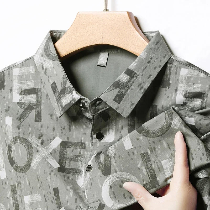 

Модная роскошная мужская рубашка-поло с лацканами, летняя новая футболка из ледяного шелка с дышащим принтом и коротким рукавом, деловая повседневная офисная мужская одежда