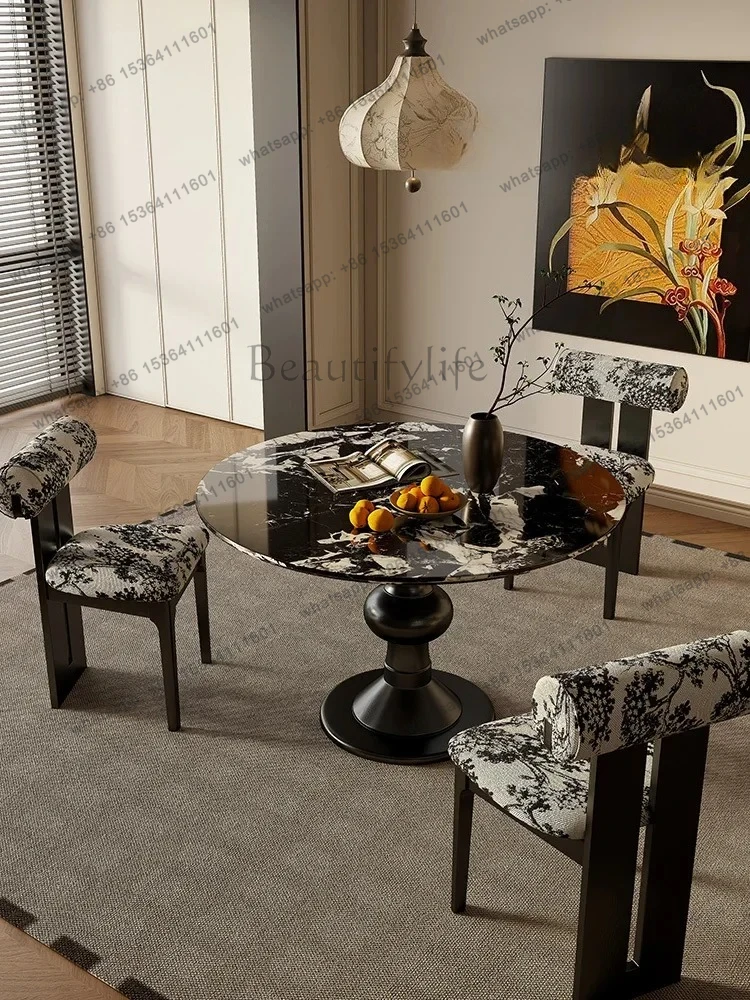 

French black natural luxury stone marble dining table and chairs high-end household solid wood round table combination