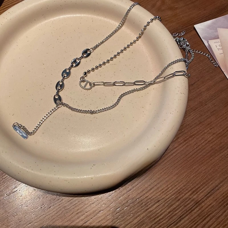 سترة من النوع الثقيل ذات سلسلة شرابة فاخرة وخفيفة الوزن بتصميم نسائي وإكسسوارات سلسلة الترقوة بمزاج بسيط