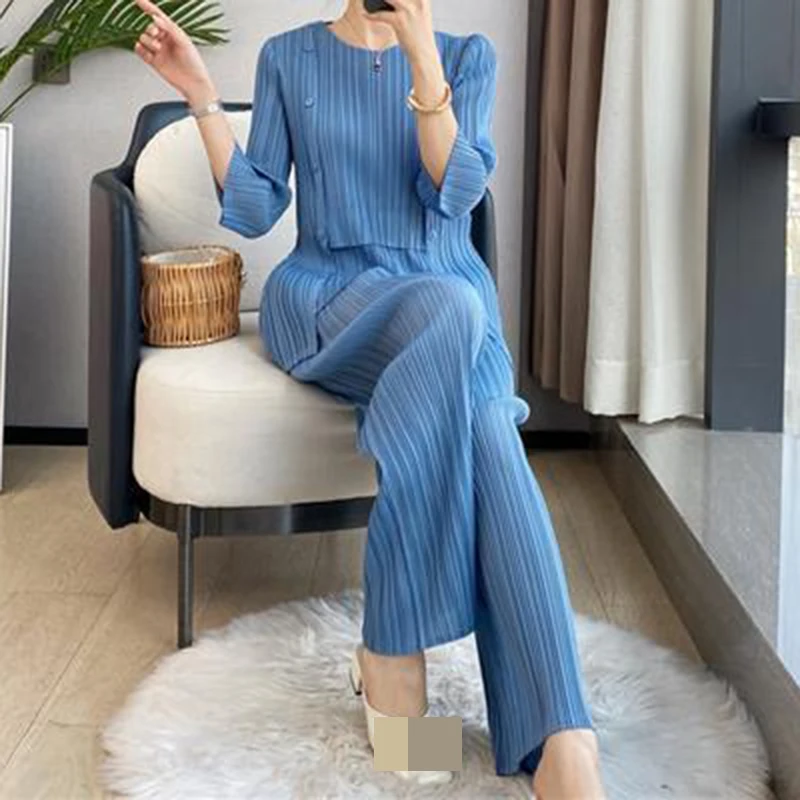 High-end light luxury women's folds spring and autumn vacation   fashion suit top straight-leg pants two-piece set  Solid