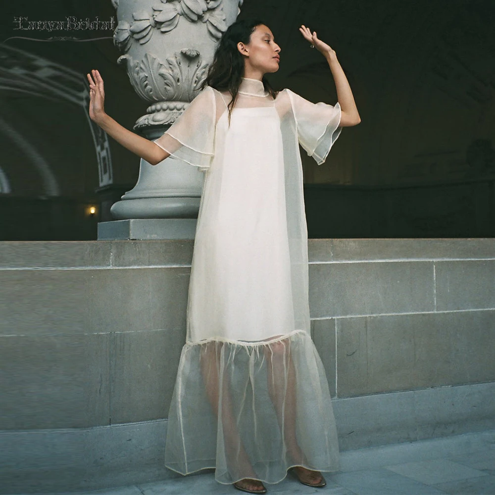 

Макси-длина, шелковая органза, пальто с короткими рукавами и оборками, прозрачная куртка с закрытыми пуговицами сзади DJ185