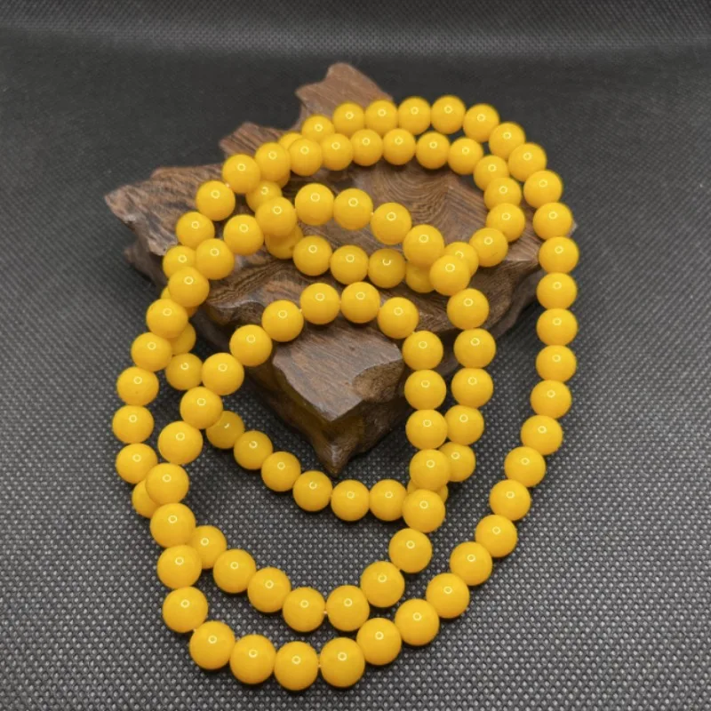 

Amber Piaohua Beeswax Chicken Oil Yellow Beads 108 Buddha Beads Bracelet Men's and Women's