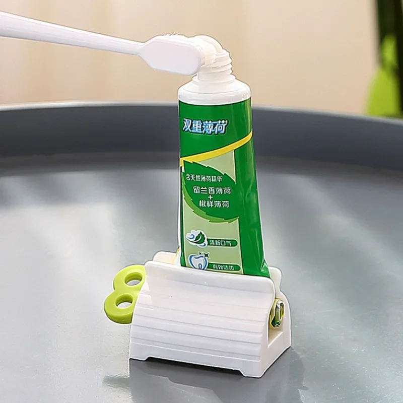 1Pc Rolling Tube Toothpaste Squeezer Toothpaste Seat Holder Stand Rotate Toothpaste Dispenser for Bathroom