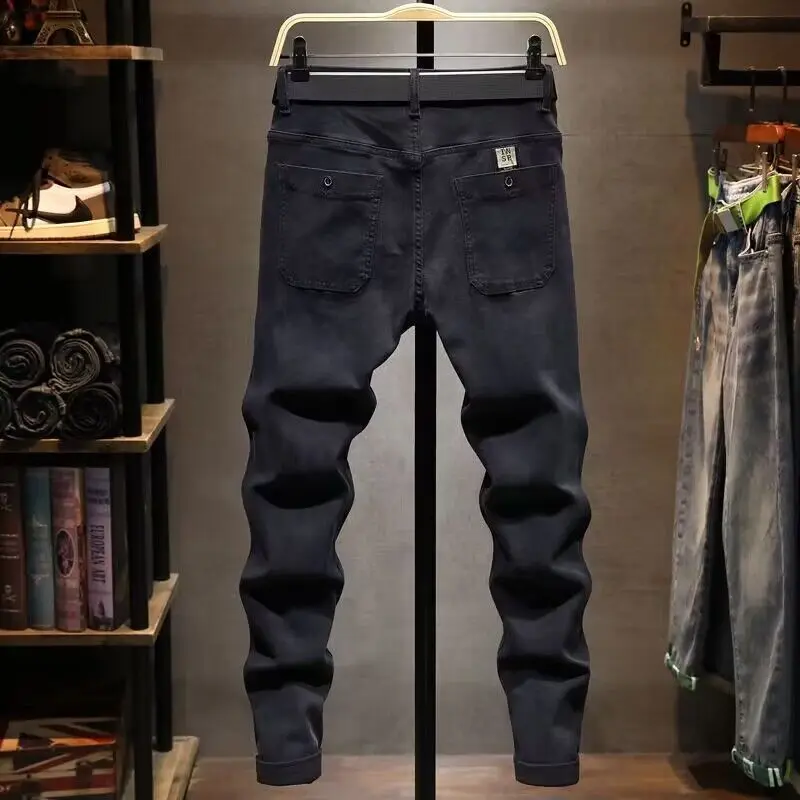 High-end na moda jeans masculino outono tendência coreana preto elástico casual fino-encaixe roupas masculinas de luxo pés pequenos calças compridas