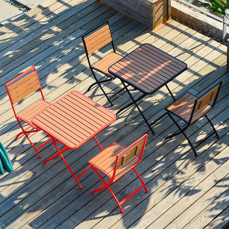 Modern simple outdoor table and chair combination table balcony cafe milk tea shop outdoor plastic wood and iron folding chair