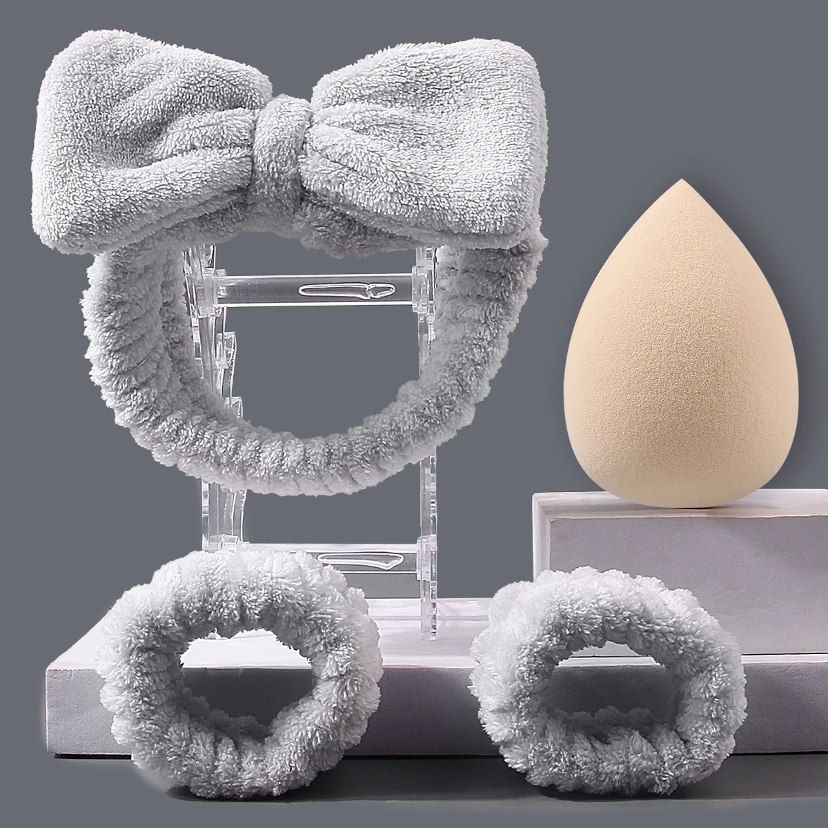 2025 Nuovo set di 4 strumenti per la cura della pelle e il trucco: include fascia per capelli con fiocco, braccialetto resistente all'acqua + set di spugna di bellezza e soffio per cipria