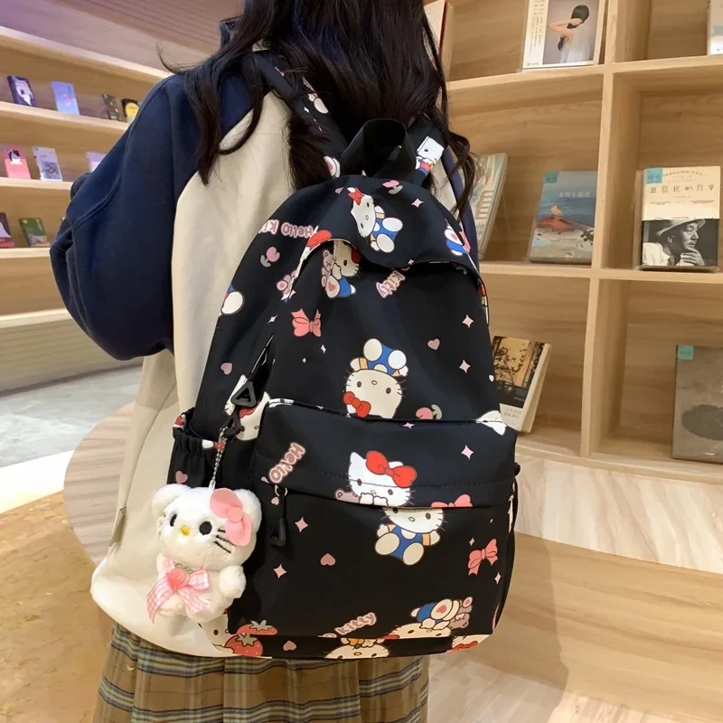 Hello Kitty graffiti student brush wave Hello Kitty backpack waterproof backpack Sanrio versatile school bag girl school bag