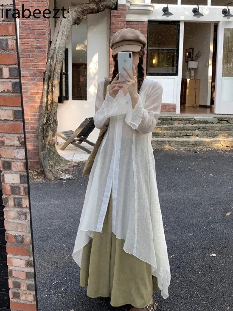 

Autumn Irregular Long-Sleeve Cut-Out Shirt for Women - Chic Bohemian Tea-Washed Floral Blouse with Side Slit Vintage Casual