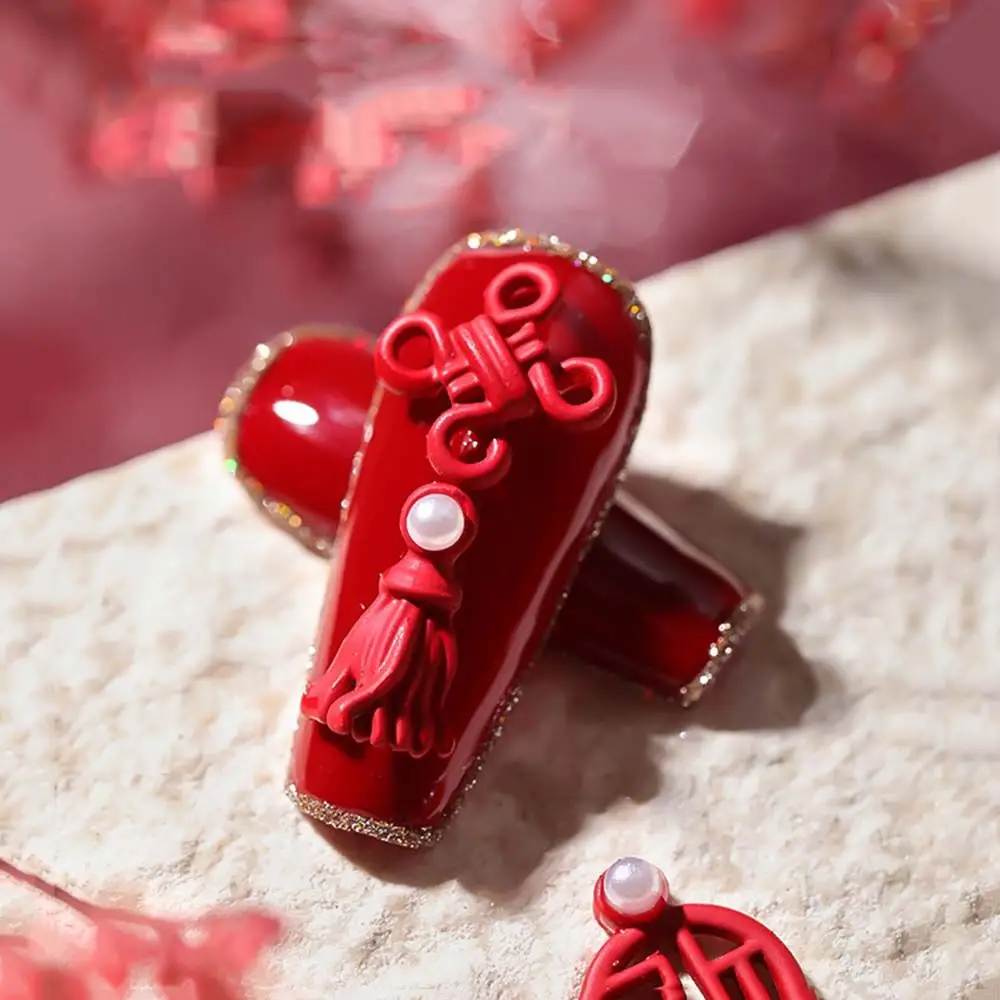 เครื่องมือทำเล็บลายปมจีนสีแดงมงคล เครื่องประดับมุก DIY ตกแต่งเล็บ ปีใหม่ ศิลปะบนเล็บ เครื่องประดับโลหะผสม