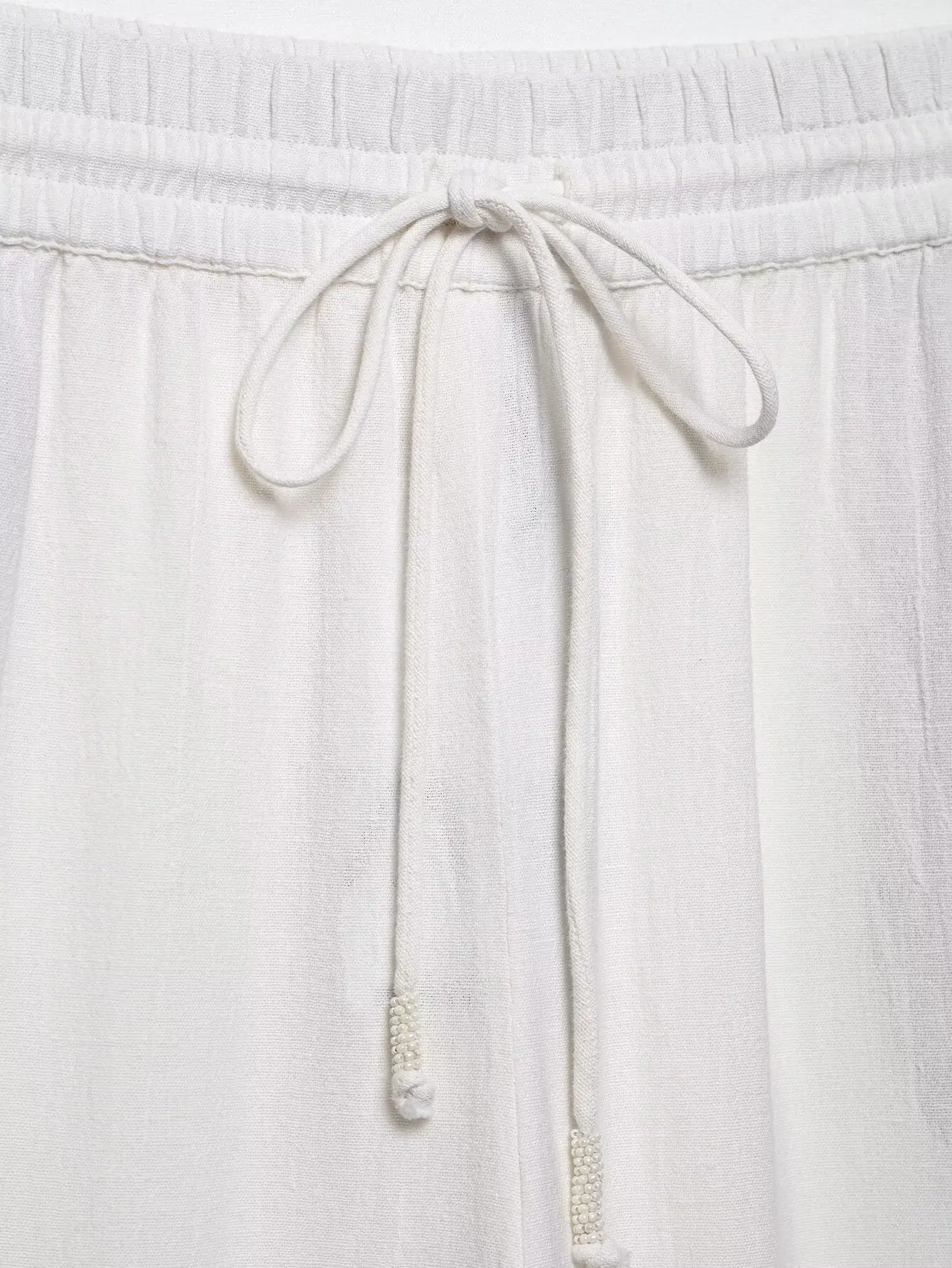 Gesticktes, aushöhlenes, zweiteiliges Set für Damen, Schnürung, O-Ausschnitt, Langarmbluse, lässige Mode, lockerer Kordelzug, weites Bein, Hosen-Sets