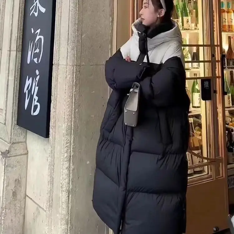 ​ ​ ผ้าฝ้ายหนาเสื้อผู้หญิง 2025 ใหม่ฤดูหนาวยาวด้านล่างเข่าหลวมเสื้อแฟชั่นปักหัวใจรัก ​ ​