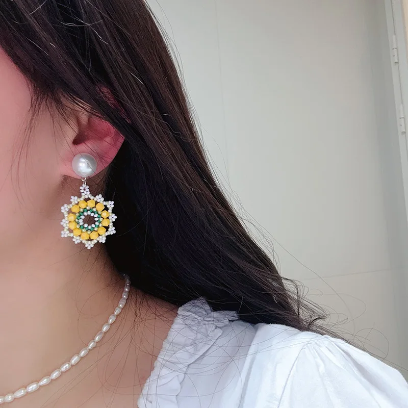 Exaggerated hand-made sunflower earrings