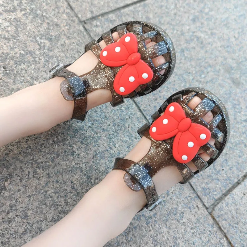 

Fashionable Summer Baby Girl Baotou Jelly Cool Slippers Children's Polka Dot Bow Princess Single Shoes Beach Shoes Girls Sandals