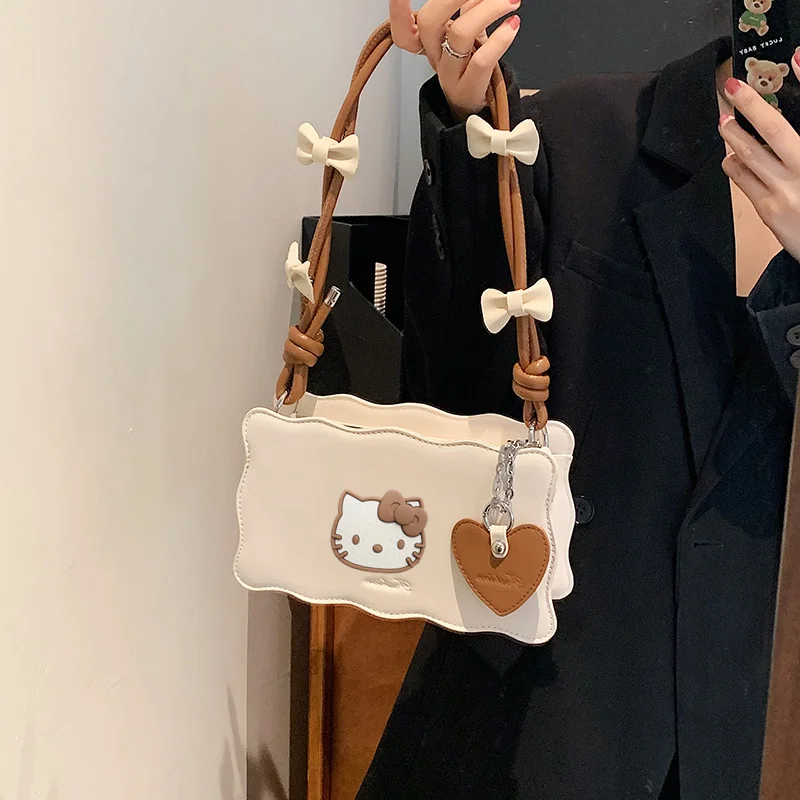 

Sanrio hello kitty модная сумка на плечо с иностранной текстурой женская новая однотонная простая сумка для печенья подмышками сумка