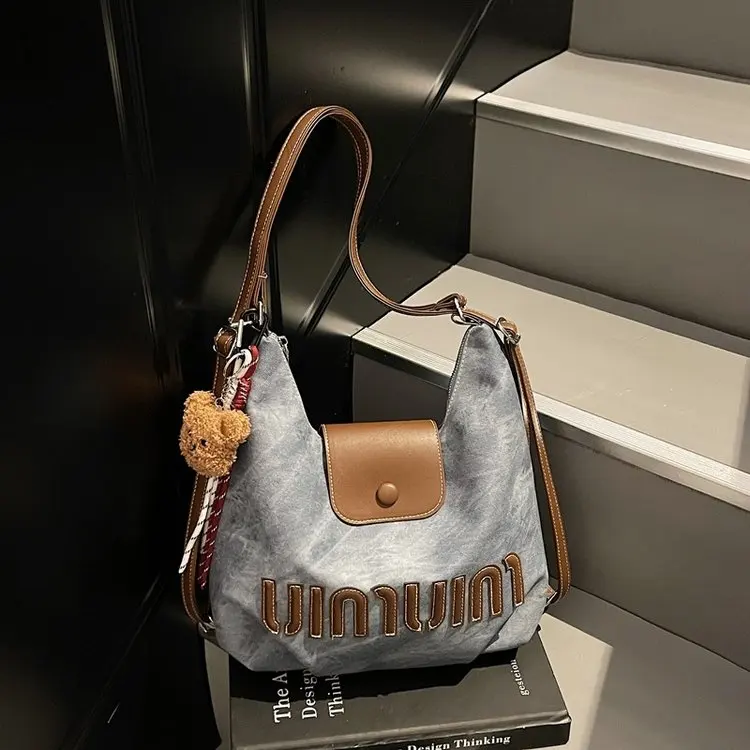 

2025 Summer 383 New Nylon Cloth Letter Average Size Zipper Denim Blue Large Capacity Commuter Messenger Bag Fashion