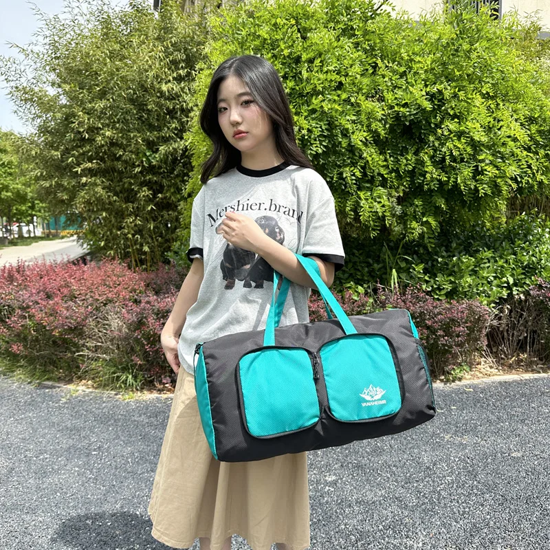 حقيبة سفر جديدة قابلة للطي للجنسين حقيبة يد ذات سعة كبيرة خفيفة الوزن متعددة الوظائف حقيبة تخزين للرياضات الخارجية والمشي لمسافات طويلة