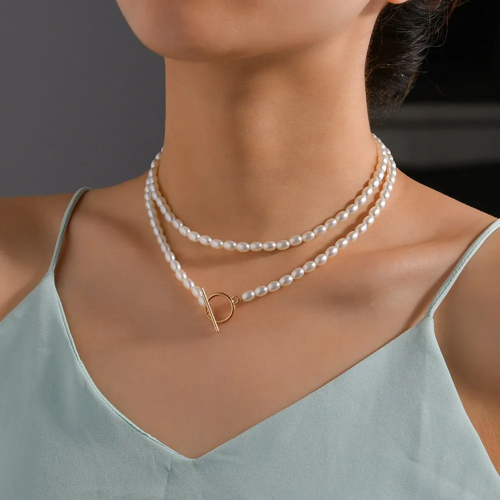 

European and American simple pearl multi-layer necklace retro fashion round iron plate OT buckle pendant accessories wholesale