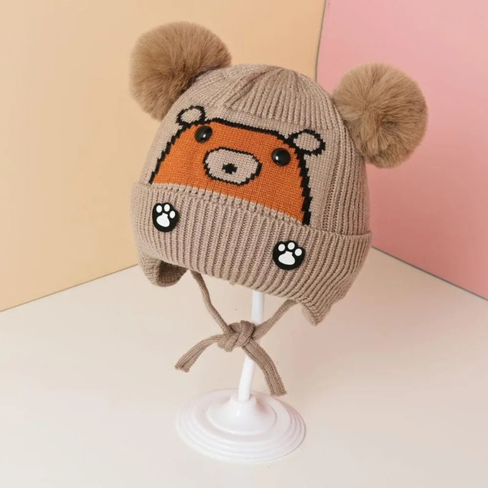 Novo inverno de malha bebê earmuffs bola de pelúcia à prova de frio bebê malha boné de pelúcia fofo engrossar chapéu quente