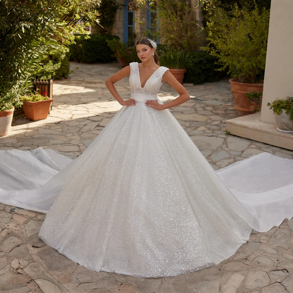 Lceland Poppy Customized V Neck Ball Gown Lace Wedding Dresses Sleeveless Beaded Backless Bridal Gowns with Chapel Train