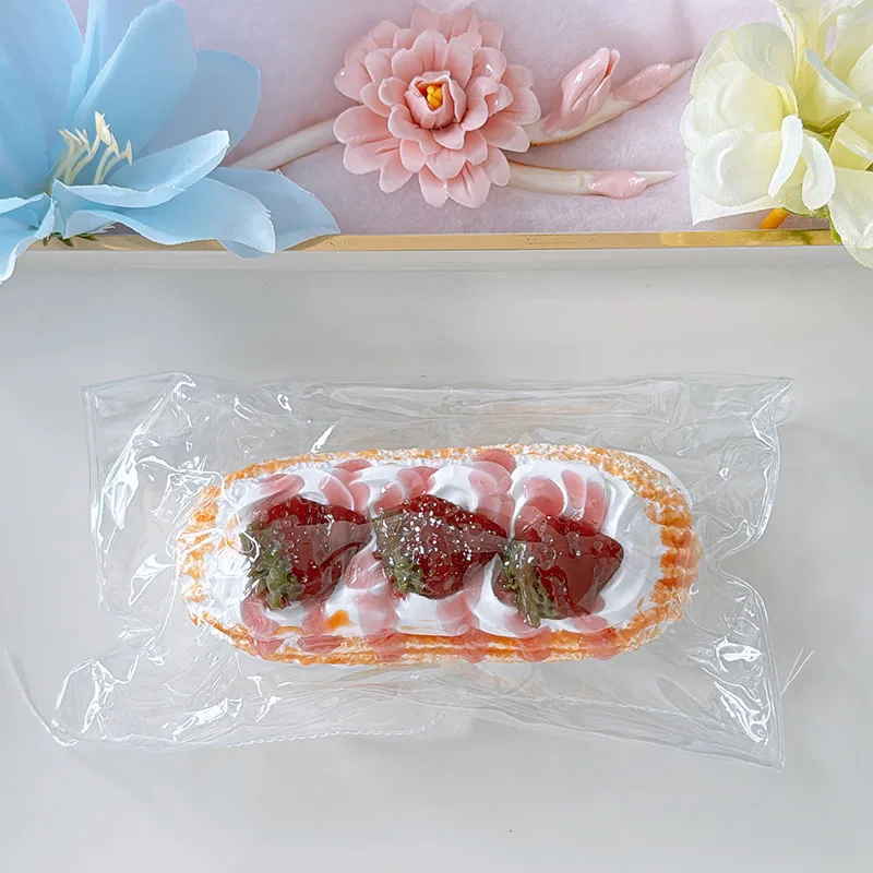 Food Grade Long Pastry Squishy Toy Decorated With Fresh Strawberry And Pink Jam Drizzle Slow Rebound Anxiety Relief Soft Squeeze