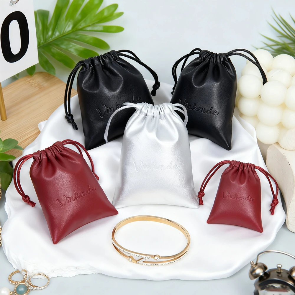 

Оптовая продажа, кожаные наушники, помада, сумка для хранения, индивидуальный логотип, подарок для путешествий, водонепроницаемый чехол для ювелирных изделий из искусственной кожи на шнурке, серьги