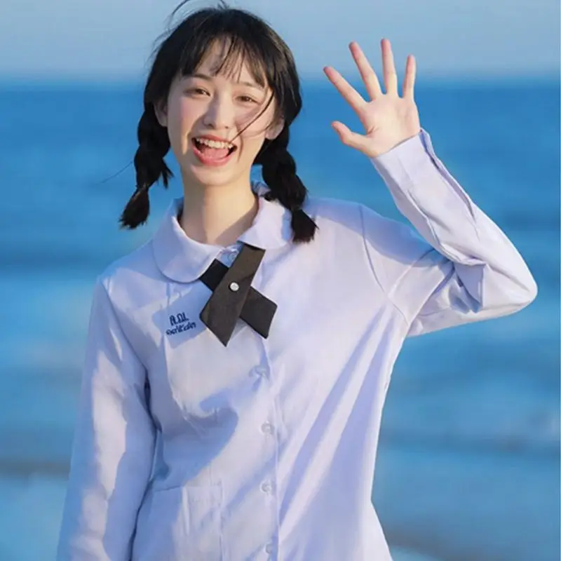 Uniforme da uomo/donna JK Uniformi scolastiche in stile tailandese Camicia bianca a maniche corte/Camicia viola chiaro Gonna a pieghe stile preppy con papillon