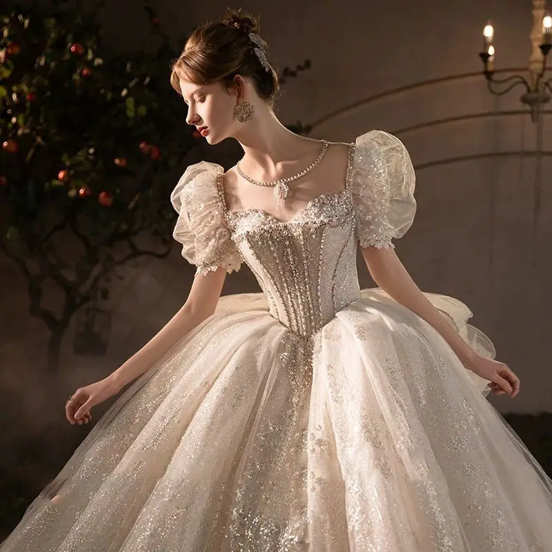 

Glitter Ball Gown Wedding Dress Sexy Sweetheart Short Sleeves Crystal Beads Formal Princess Dubai Arabia Puffy Bridal Gown Robe