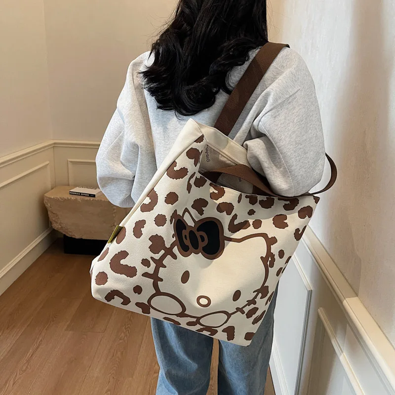 

Hello Kitty модная парусиновая большая вместительная сумка женская sanrio новая милая сумка с леопардовым принтом hello kitty студенческая пригородная сумка для покупок