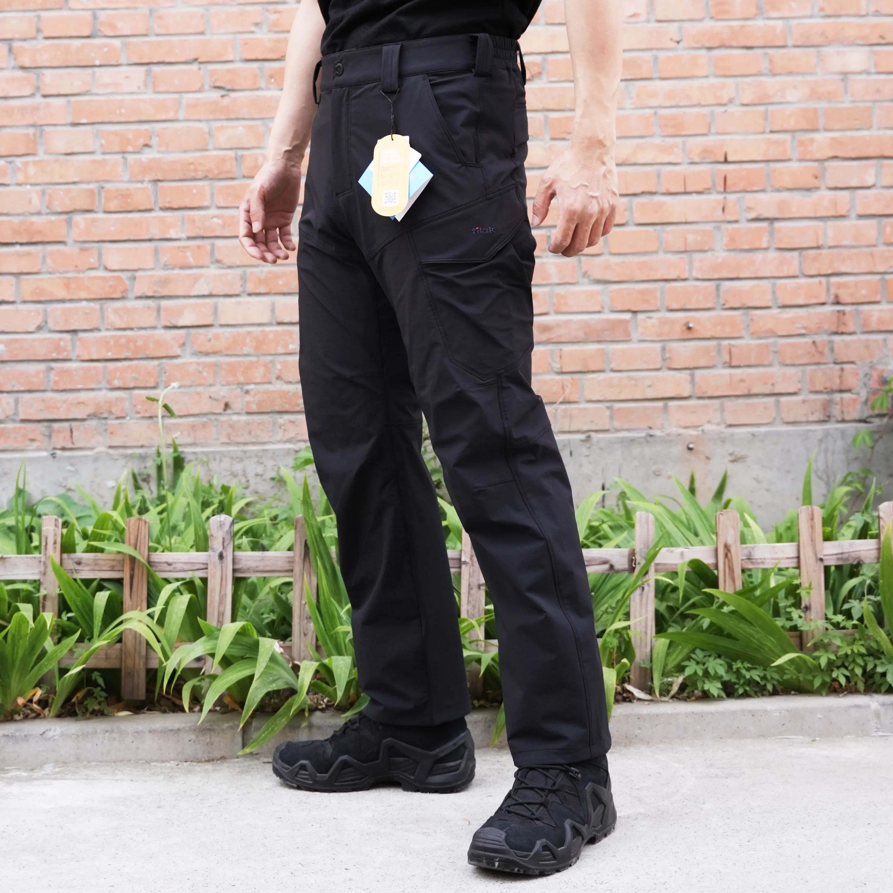 Outdoor quick drying soft shell pants for hiking, wear-resistant, waterproof, and elastic tactics