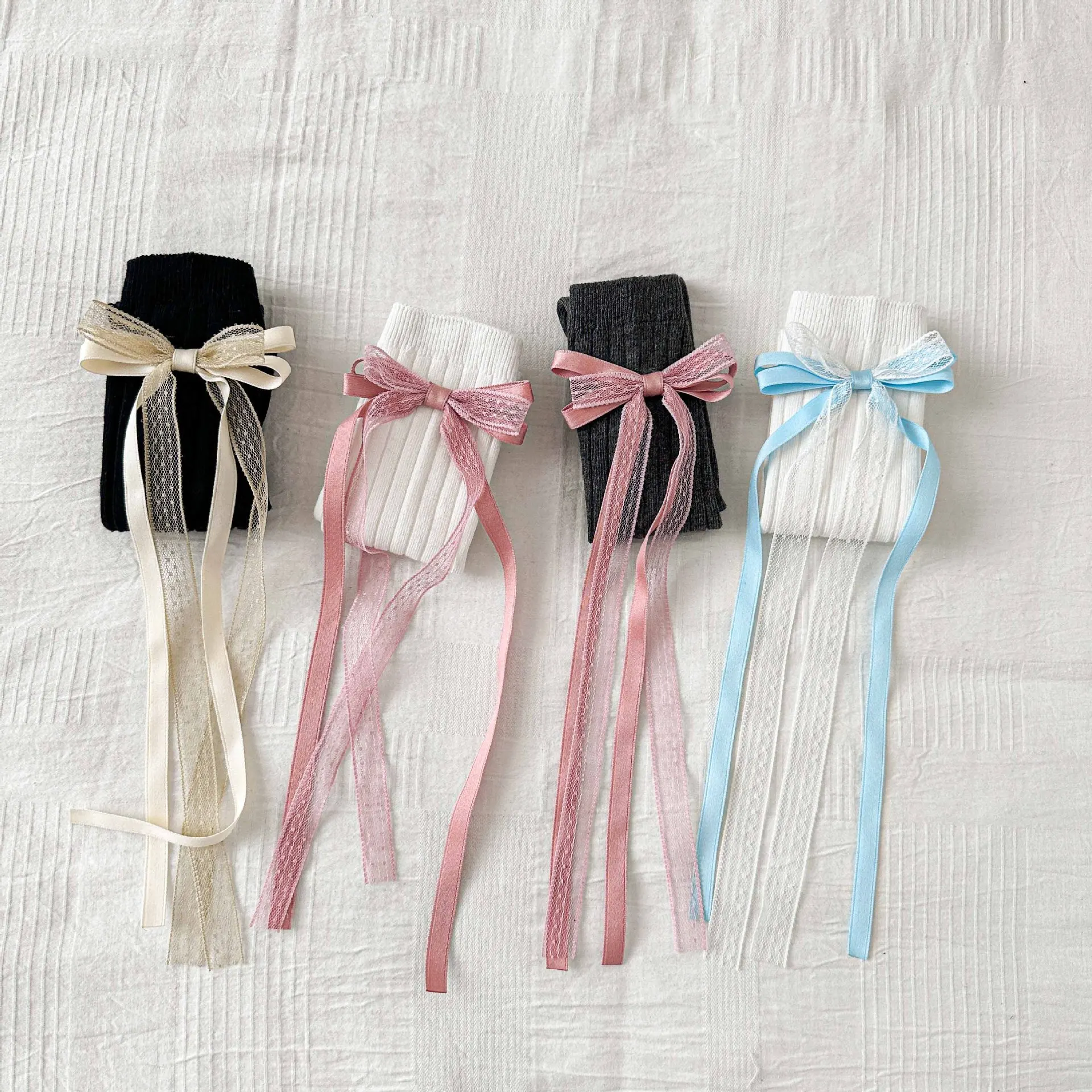 جوارب ربيع 2026 للأطفال البنات جوارب حلوة متوسطة الطول للفتيات جوارب طويلة بعقدة على شكل فيونكة على طراز القرآن جوارب للأطفال بشرابة #3