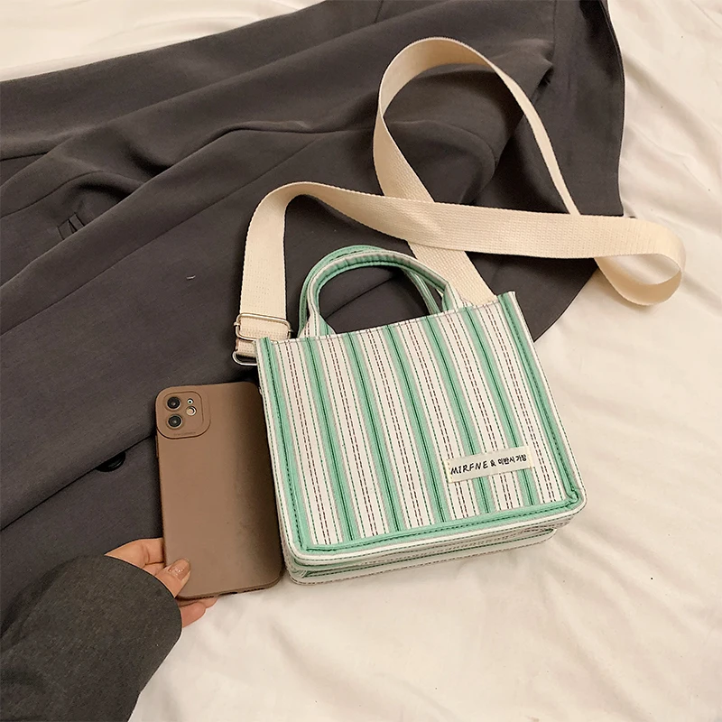 2024 New women\'s shoulder bag Square bag Fashion matching color striped pattern Delicate compact high-end design Mom Female girl